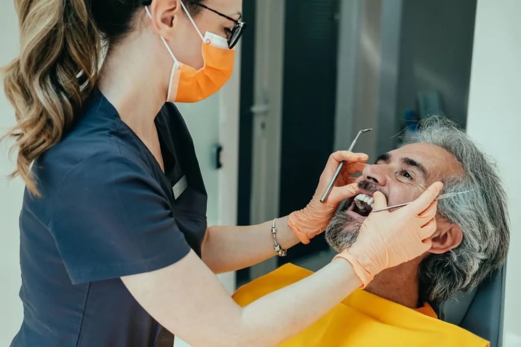 Charlotte Preventative Dentist Performing a Dental Exam