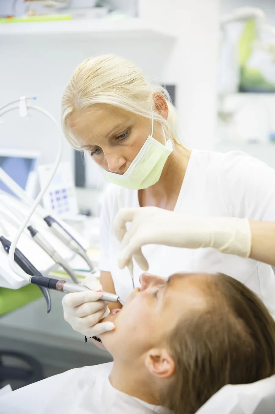 dentist on providence road dental treatment with patient